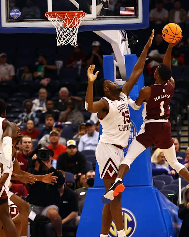 Mar 10, 2022; Tampa, FL, USA; Mississippi State Bulldogs guard Iverson Molinar (1) shoots as South Carolina Gamecocks forward Wildens Leveque (15) defends during the first half at Amalie Arena. Mandatory Credit: Kim Klement-USA TODAY Sports